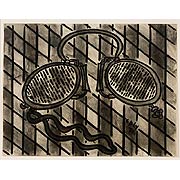 Brille auf grauen Karos